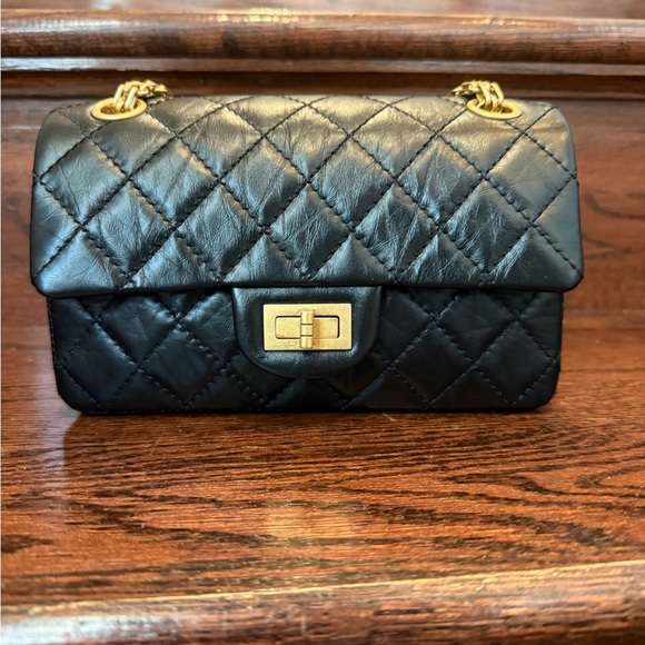 CHANEL Black Quilted 255 Mini Bag with aged gold hardware - Picture 1 of 12